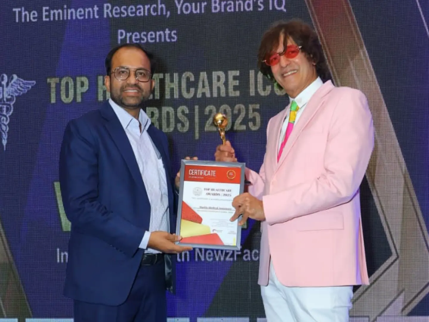 Award photograph, Best Medical Tourism Company, awarded to Marlin Medical Assistance, presented by Eminent Research at Top Healthcare Icon Awards 2025.
